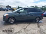 ✅ 2012 Mazda 5 Sport • VIN: JM1CW2BL6C0130500 • Lot: 42258823. Listed on IAAI with 140,243 mi. Free auction sales archive from the USA and detailed vehicle history report at DreamBid. Image 15.