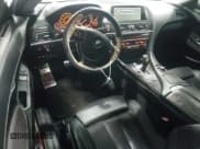 ✅ 2013 BMW 6 Series 650i xDrive • VIN: WBAYM1C52DDZ02486 • Lot: 56756655. Listed on Copart with 92,054 mi. Free auction sales archive from the USA and detailed vehicle history report at DreamBid. Image 8.