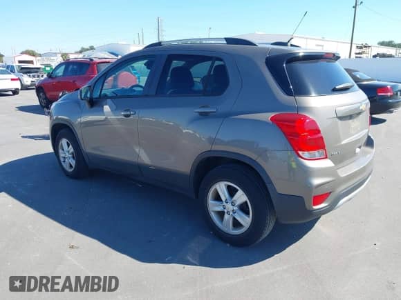 2021 Chevrolet Trax LT with VIN KL7CJLSBXMB310917, listed as a IAAI auction lot 43442049 with Not provided miles and . Bid and sale history available at DreamBid. Image 3.