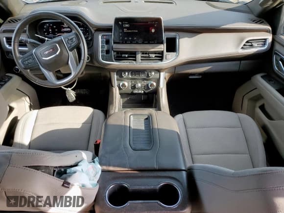 ✅ 2022 GMC Yukon SLE • VIN: 1GKS1AKD4NR174110 • Lot: 59767025. Wystawiony na Copart z przebiegiem 63 055 mil. Bezpłatny archiwum sprzedaży aukcyjnych z USA i szczegółowy raport historii pojazdu na DreamBid. Zdjęcie 8.