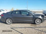 ✅ 2019 Ford Fusion SE • VIN: 3FA6P0HD8KR247885 • Lot: 43512141. Listed on IAAI with 107,334 mi. Free auction sales archive from the USA and detailed vehicle history report at DreamBid. Image 13.