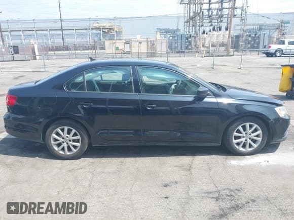 ✅ 2015 Volkswagen Jetta SE • VIN: 3VWD17AJXFM259306 • Lot: 42418042. Listed on IAAI with 199,780 mi. Free auction sales archive from the USA and detailed vehicle history report at DreamBid. Image 12.
