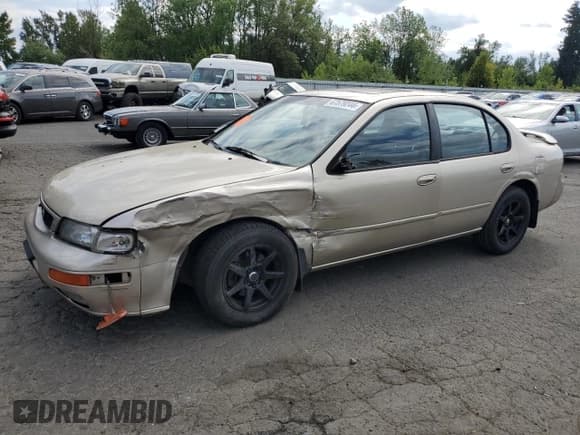 ✅ 1996 Nissan Maxima GXE • VIN: JN1CA21D7TM424542 • Lot: 82168805. Listed on Copart with 159,096 mi. Free auction sales archive from the USA and detailed vehicle history report at DreamBid. Image 1.