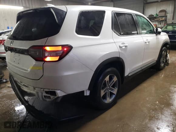 ✅ 2023 Honda Pilot EX-L • VIN: 5FNYG1H56PB043273 • Лот: 88769535. Опубликован ранее на Copart с пробегом 19 033 миль. Бесплатный доступ к архиву аукционных продаж из США и подробный отчёт об истории автомобиля на DreamBid. Изображение 3.