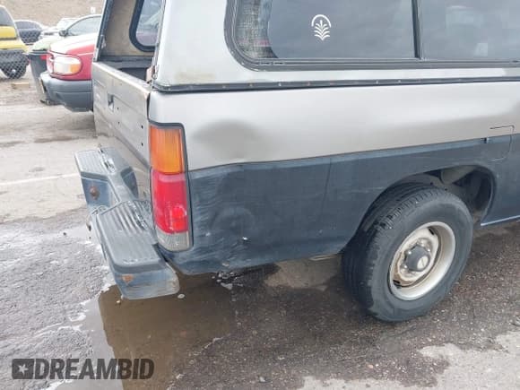 ✅ 1986 Nissan D21 • VIN: JN6HD16S5GW004992 • Lot: 42797216. Listed on IAAI with 334,803 mi. Free auction sales archive from the USA and detailed vehicle history report at DreamBid. Image 6.