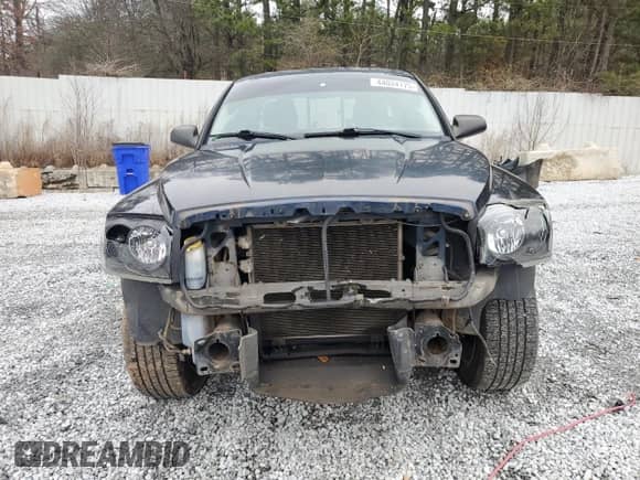 2006 Dodge Dakota SLT z VIN 1D7HE42N16S702822, wystawiony jako Copart lot #44034175 z przebiegiem 141 509 mil mil oraz Szkoda całkowita • Salvage title. Historia ofert i sprzedaży dostępna na DreamBid. Obrazek 5.