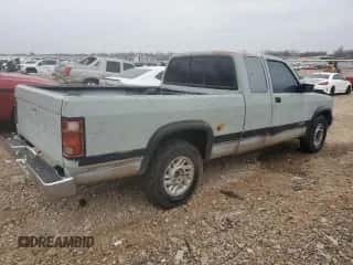 1992 Dodge Dakota z VIN 1B7GL23Y2NS657705, wystawiony jako Copart lot #44554435 z przebiegiem 223 491 mil mil oraz Szkoda całkowita • Salvage title. Historia ofert i sprzedaży dostępna na DreamBid. Obrazek 3.