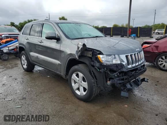 ✅ 2013 Jeep Grand Cherokee Laredo • VIN: 1C4RJFAG5DC559857 • Lot: 85663295. Listed on Copart with 181,585 mi. Free auction sales archive from the USA and detailed vehicle history report at DreamBid. Image 4.