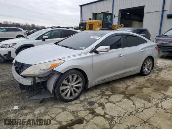 2012 Hyundai Azera with VIN KMHFH4JG3CA192580, listed as a Copart auction lot 82609194 with 127,887 mi miles and Salvage title. Bid and sale history available at DreamBid. Image 1.