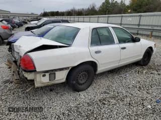✅ 2001 Ford Crown Victoria Police Interceptor • VIN: 2FAFP71W01X165220 • Лот: 43380784. Опубликован ранее на Copart с пробегом 155 877 миль. Бесплатный доступ к архиву аукционных продаж из США и подробный отчёт об истории автомобиля на DreamBid. Изображение 3.