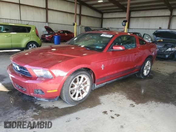 ✅ 2011 Ford Mustang V6 • VIN: 1ZVBP8AMXB5123635 • Lot: 87105185. Listed on Copart with 112,835 mi. Free auction sales archive from the USA and detailed vehicle history report at DreamBid. Image 1.