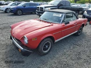 ✅ 1977 FIAT 124 Spider • VIN: 124CS10115297 • Лот: 61256485. Опубликован ранее на Copart с пробегом 45 492 миль. Бесплатный доступ к архиву аукционных продаж из США и подробный отчёт об истории автомобиля на DreamBid. Изображение 1.