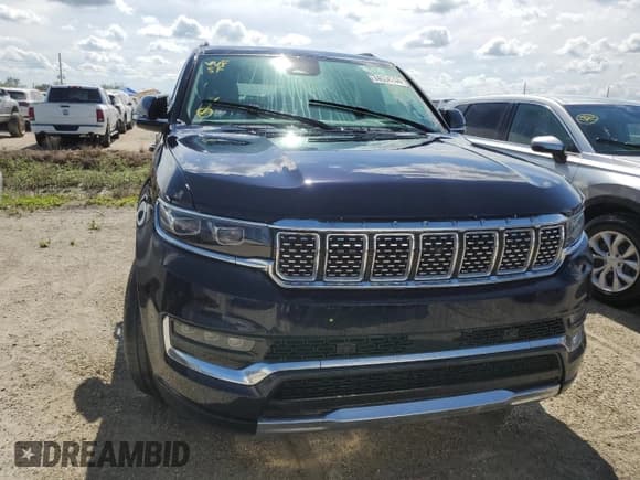 ✅ 2023 Jeep Grand Wagoneer • VIN: 1C4SJVEJ7PS506234 • Lot: 74534244. Wystawiony na Copart z przebiegiem 13 586 mil. Bezpłatny archiwum sprzedaży aukcyjnych z USA i szczegółowy raport historii pojazdu na DreamBid. Zdjęcie 5.