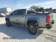 ✅ 2018 Chevrolet Colorado 4WD Z71 • VIN: 1GCGTDEN6J1288071 • Лот: 81923664. Опубликован ранее на Copart с пробегом 118 372 миль. Бесплатный доступ к архиву аукционных продаж из США и подробный отчёт об истории автомобиля на DreamBid. Изображение 2.