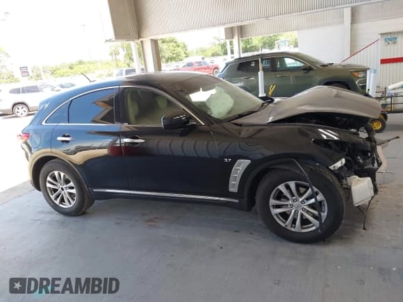 ✅ 2017 Infiniti QX70 • VIN: JN8CS1MU1HM143574 • Lot: 42546397. Listed on IAAI with 103,624 mi. Free auction sales archive from the USA and detailed vehicle history report at DreamBid. Image 13.