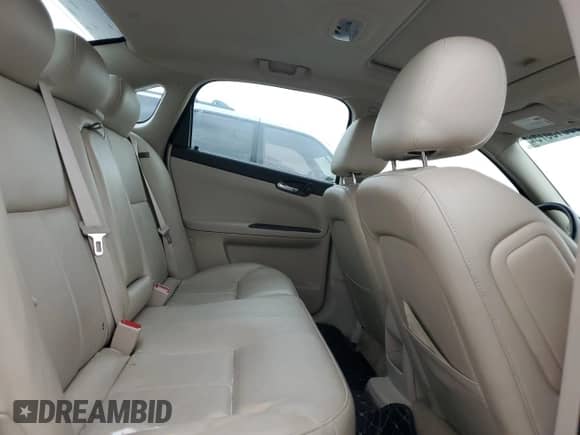 2010 Chevrolet Impala LTZ z VIN 2G1WC5EM4A1219729, wystawiony jako Copart lot #90013675 z przebiegiem 123 560 mil mil oraz Czysty tytuł • Clean title. Historia ofert i sprzedaży dostępna na DreamBid. Obrazek 10.