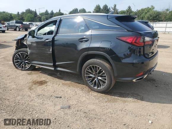 ✅ 2022 Lexus RX 350 F Sport • VIN: 2T2SZMDA2NC356452 • Lot: 64190135. Listed on Copart with 28,932 mi. Free auction sales archive from the USA and detailed vehicle history report at DreamBid. Image 2.