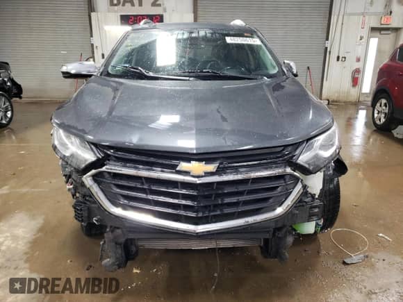 2018 Chevrolet Equinox Premier с VIN 3GNAXPEU5JS635771, выставлен на аукционе Copart как лот 48250615 с пробегом Не указан миль и Списание • Salvage title. История ставок и продаж доступна на DreamBid. Изображение 5.