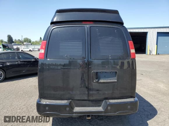 ✅ 2018 Chevrolet Express Cargo • VIN: 1GCWGBFG5J1242705 • Lot: 55627615. Listed on Copart with 77,611 mi. Free auction sales archive from the USA and detailed vehicle history report at DreamBid. Image 6.