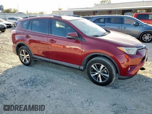 ✅ 2018 Toyota RAV4 XLE • VIN: 2T3WFREV4JW418494 • Lot: 92693275. Listed on Copart with 104,538 mi. Free auction sales archive from the USA and detailed vehicle history report at DreamBid. Image 4.