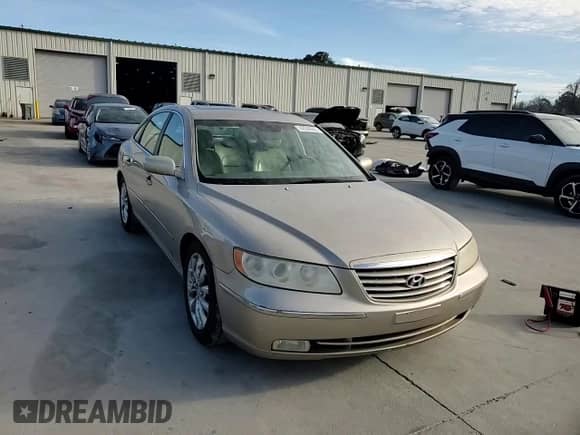 2006 Hyundai Azera SE с VIN KMHFC46F86A109521, выставлен на аукционе Copart как лот 42508805 с пробегом 215 583 миль миль и Списание • Salvage title. История ставок и продаж доступна на DreamBid. Изображение 11.