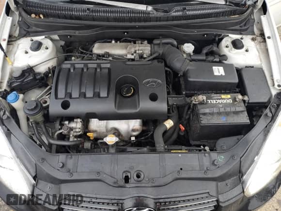 2009 Hyundai Accent Auto GLS z VIN KMHCN46C29U348942, wystawiony jako Copart lot #80129844 z przebiegiem 98 868 mil mil oraz Szkoda całkowita • Salvage title. Historia ofert i sprzedaży dostępna na DreamBid. Obrazek 11.