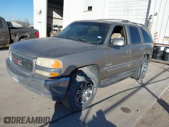 ✅ 2001 GMC Yukon SLT • VIN: 1GKEK13T11R164029 • Lot: 41518776. Listed on IAAI with 329,836 mi. Free auction sales archive from the USA and detailed vehicle history report at DreamBid. Image 2.