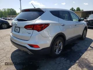 ✅ 2018 Hyundai Santa Fe 2.4L • VIN: 5XYZTDLB2JG534602 • Лот: 53190482. Опубликован ранее на Copart с пробегом 93 659 миль. Бесплатный доступ к архиву аукционных продаж из США и подробный отчёт об истории автомобиля на DreamBid. Изображение 4.