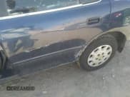 ✅ 1995 Toyota Camry LE • VIN: JT2SK12E8S0323032 • Lot: 32940318. Wystawiony na IAAI z przebiegiem 244 816 mil. Bezpłatny archiwum sprzedaży aukcyjnych z USA i szczegółowy raport historii pojazdu na DreamBid. Zdjęcie 6.