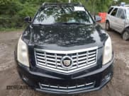 ✅ 2014 Cadillac SRX Performance Collection • VIN: 3GYFNFE35ES529956 • Lot: 42885364. Listed on IAAI with 223,000 mi. Free auction sales archive from the USA and detailed vehicle history report at DreamBid. Image 13.