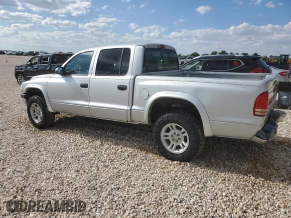 2002 Dodge Dakota Sport z VIN 1B7HG38N02S691280, wystawiony jako Copart lot #66309924 z przebiegiem 227 327 mil mil oraz Czysty tytuł • Clean title. Historia ofert i sprzedaży dostępna na DreamBid. Obrazek 2.
