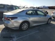✅ 2022 Toyota Camry Hybrid LE • VIN: 4T1C31AK2NU579899 • Lot: 70712105. Wystawiony na Copart z przebiegiem 153 521 mil. Bezpłatny archiwum sprzedaży aukcyjnych z USA i szczegółowy raport historii pojazdu na DreamBid. Zdjęcie 3.