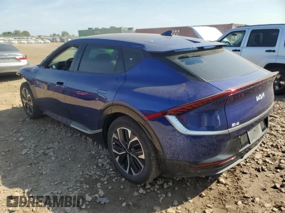 ✅ 2023 Kia EV6 Wind • VIN: KNDC3DLC4P5099033 • Lot: 80454245. Wystawiony na Copart z przebiegiem 28 323 mil. Bezpłatny archiwum sprzedaży aukcyjnych z USA i szczegółowy raport historii pojazdu na DreamBid. Zdjęcie 2.