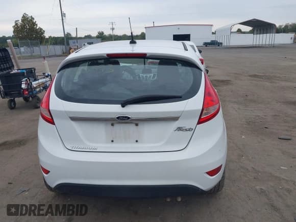 ✅ 2013 Ford Fiesta Titanium • VIN: 3FADP4FJ0DM154155 • Lot: 43348593. Wystawiony na IAAI z przebiegiem 141 783 mil. Bezpłatny archiwum sprzedaży aukcyjnych z USA i szczegółowy raport historii pojazdu na DreamBid. Zdjęcie 16.