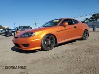 2006 Hyundai Tiburon GT с VIN KMHHN65FX6U221882, выставлен на аукционе Copart как лот 57456825 с пробегом 203 312 миль миль и Списание • Salvage title. История ставок и продаж доступна на DreamBid. Изображение 1.