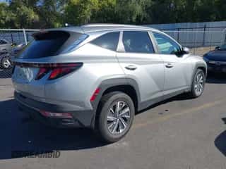 2024 Hyundai Tucson Blue with VIN KM8JBCD14RU209729, listed as a IAAI auction lot 43321625 with 13,661 mi miles and . Bid and sale history available at DreamBid. Image 4.