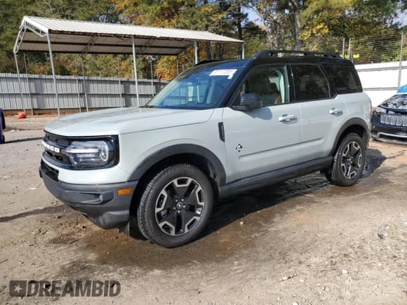✅ 2023 Ford Bronco Sport Outer Banks • VIN: 3FMCR9C66PRD00137 • Лот: 91117285. Опубликован ранее на Copart с пробегом 95 377 миль. Бесплатный доступ к архиву аукционных продаж из США и подробный отчёт об истории автомобиля на DreamBid. Изображение 1.