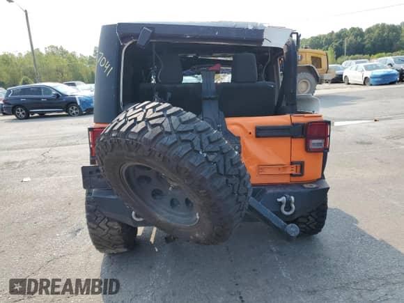 2012 Jeep Wrangler Sport z VIN 1C4AJWAGXCL187041, wystawiony jako Copart lot #71404335 z przebiegiem 127 412 mil mil oraz Szkoda całkowita • Salvage title. Historia ofert i sprzedaży dostępna na DreamBid. Obrazek 6.