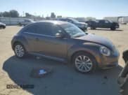 ✅ 2014 Volkswagen Beetle 2.0L TDI • VIN: 3VWJL7AT0EM662093 • Лот: 50435195. Опубликован ранее на Copart с пробегом 76 897 миль. Бесплатный доступ к архиву аукционных продаж из США и подробный отчёт об истории автомобиля на DreamBid. Изображение 4.