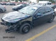 ✅ 2019 Toyota Camry SE • VIN: 4T1B11HK4KU243285 • Lot: 43667487. Listed on IAAI with 132,894 mi. Free auction sales archive from the USA and detailed vehicle history report at DreamBid. Image 20.