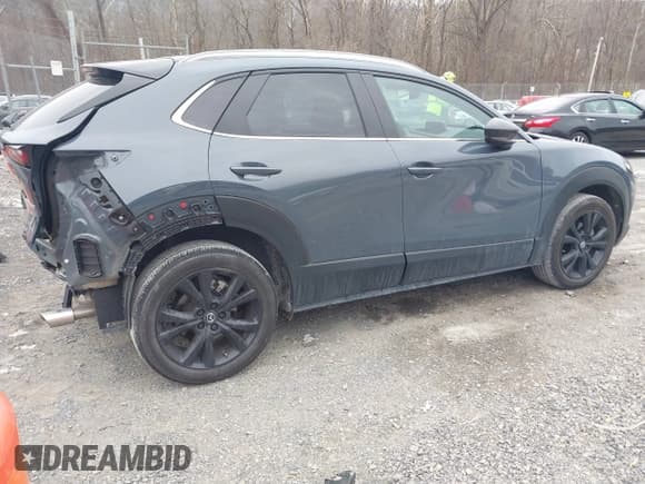 ✅ 2023 Mazda CX-30 S Carbon Edition • VIN: 3MVDMBCM8PM584296 • Lot: 41390814. Listed on IAAI with 19,959 mi. Free auction sales archive from the USA and detailed vehicle history report at DreamBid. Image 4.