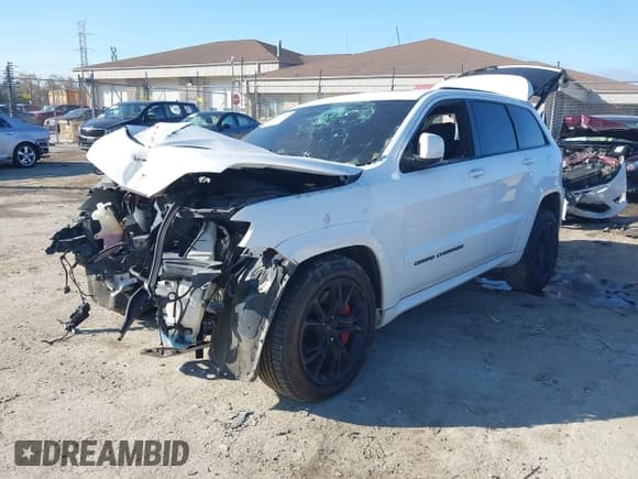 ✅ 2017 Jeep Grand Cherokee SRT • VIN: 1C4RJFDJ7HC726927 • Lot: 43541437. Listed on IAAI with Not provided. Free auction sales archive from the USA and detailed vehicle history report at DreamBid. Image 2.