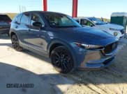 ✅ 2021 Mazda CX-5 Carbon Edition • VIN: JM3KFACY6M0352026 • Lot: 43709716. Listed on IAAI with 60,193 mi. Free auction sales archive from the USA and detailed vehicle history report at DreamBid. Image 1.
