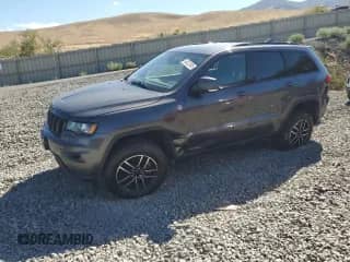 2019 Jeep Grand Cherokee Trailhawk with VIN 1C4RJFLG0KC553944, listed as a Copart auction lot 68022805 with 103,477 mi miles and Salvage title. Bid and sale history available at DreamBid. Image 1.