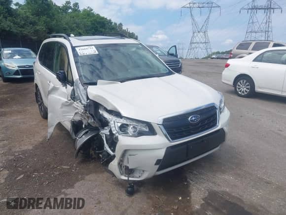 2018 Subaru Forester Touring z VIN JF2SJGWC3JH607000, wystawiony jako IAAI lot #42664722 z przebiegiem 30 857 mil mil oraz . Historia ofert i sprzedaży dostępna na DreamBid. Obrazek 18.