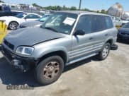 ✅ 1999 Toyota RAV4 • VIN: JT3GP10V0X7045926 • Lot: 42631155. Wystawiony na IAAI z przebiegiem 254 985 mil. Bezpłatny archiwum sprzedaży aukcyjnych z USA i szczegółowy raport historii pojazdu na DreamBid. Zdjęcie 2.