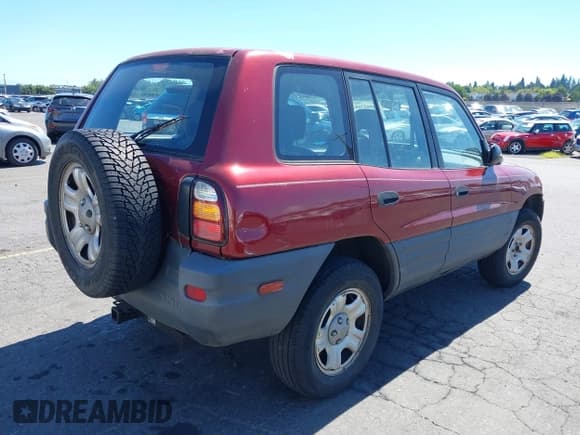 ✅ 1999 Toyota RAV4 • VIN: JT3HP10V9X7132731 • Lot: 42985768. Listed on IAAI with 189,535 mi. Free auction sales archive from the USA and detailed vehicle history report at DreamBid. Image 4.