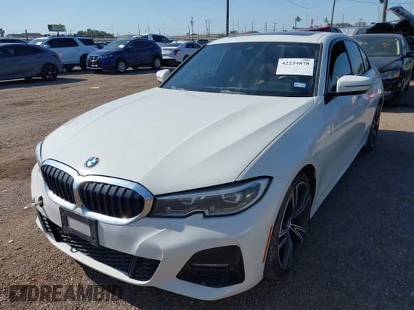 ✅ 2022 BMW 3 Series 330i • VIN: 3MW5R1J06N8C42821 • Lot: 42234878. Listed on IAAI with 60,888 mi. Free auction sales archive from the USA and detailed vehicle history report at DreamBid. Image 2.