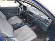 ✅ 1992 Mitsubishi Mirage • VIN: 4A3CU26A2NE030752 • Lot: 43037504. Wystawiony na IAAI z przebiegiem 93 053 mil. Bezpłatny archiwum sprzedaży aukcyjnych z USA i szczegółowy raport historii pojazdu na DreamBid. Zdjęcie 5.