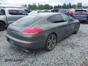 ✅ 2014 Porsche Panamera • VIN: WP0AA2A70EL005911 • Lot: 42620213. Listed on IAAI with 104,053 mi. Free auction sales archive from the USA and detailed vehicle history report at DreamBid. Image 4.